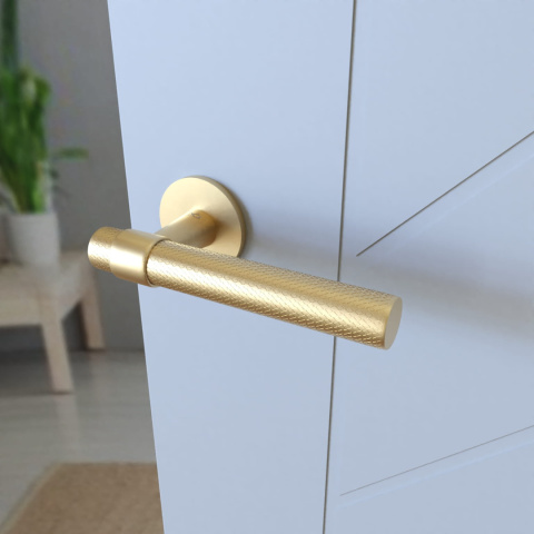 Klamka Ghost KGOS M G00 złoty mat na rozecie okrągłej Infinity Line