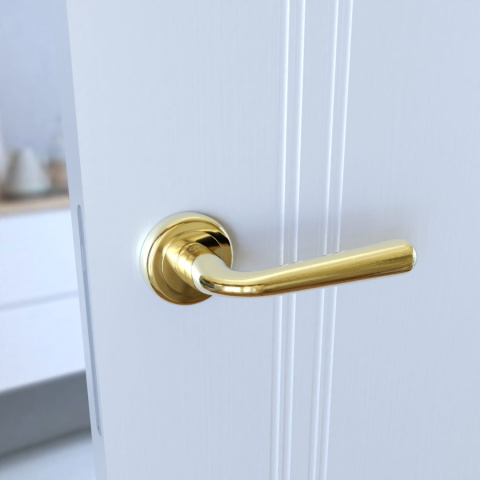 Klamka Lea KLE G00 PVD złota na rozecie okrągłej Infinity Line