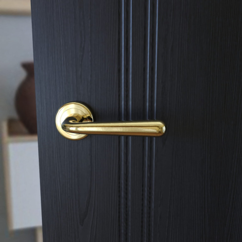 Klamka Lea KLE G00 PVD złota na rozecie okrągłej Infinity Line