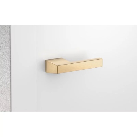 Klamka Maxima mosiądz matowy na rozecie ukrytej prostokątnej Corona