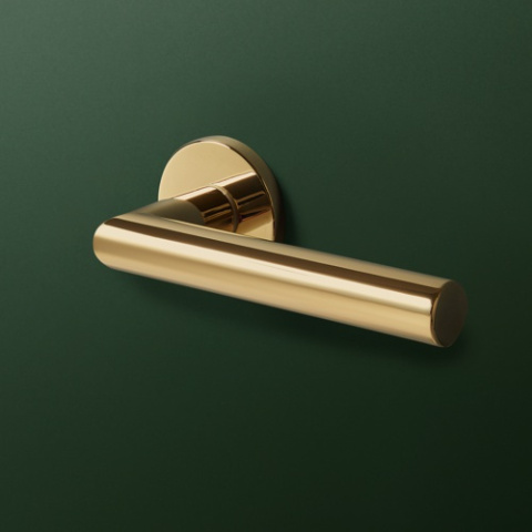 Klamka Vinci fit złota PVD na rozecie okrągłej VDS