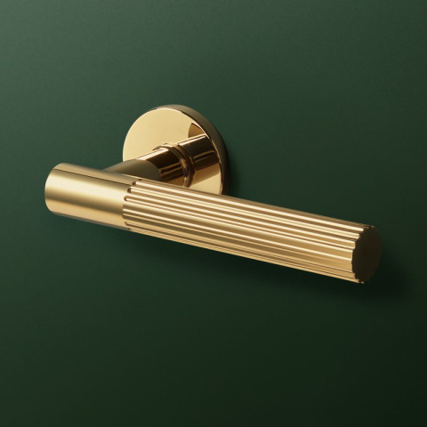 Klamka Livia fit złota PVD na rozecie okrągłej VDS