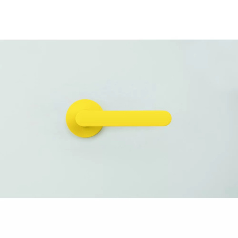 Klamka One cytrynowy żółty na rozecie okrągłej Colombo