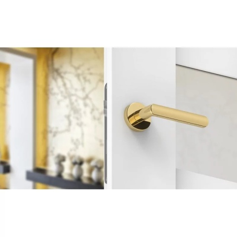 Klamka Icona R Slim mosiądz błyszczący PVD na rozecie okrągłej Corona