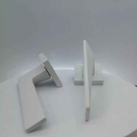 Klamka Blade biała na rozecie kwadratowej Corona